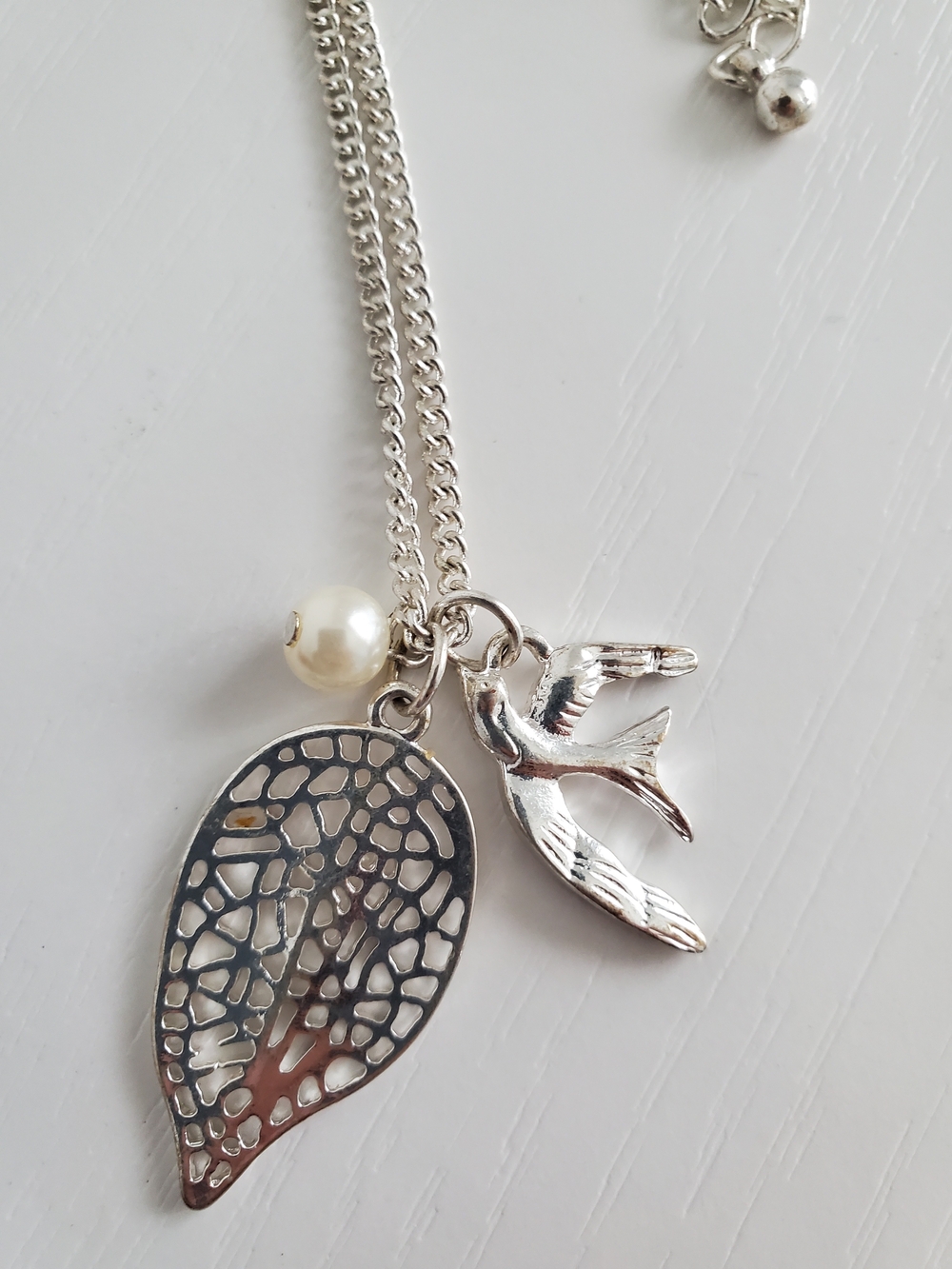 Silver Leaf and Swallow Charm Necklace with Pearl Accent